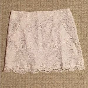 White eyelet mini skirt